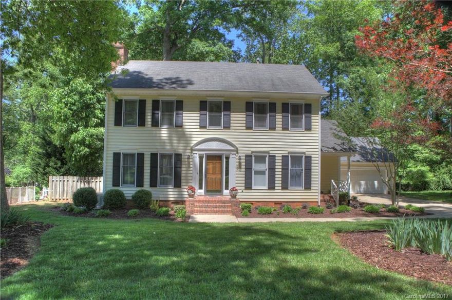 Welcome home to this beautifully landscaped 3br 2.5ba home in the highly sought after Rawlinson Acres subdivision. Enjoy your beautiful, private backyard and homemade fire pit from the screened porch . Inside, all of the tile and carpet are new and the hardwoods have been refinished. The upstairs bathroom has been beautifully remodeled. This home is perfectly situated just minutes from shopping and schools. There is even a walking trail leading to the elementary school.This home won't last long!