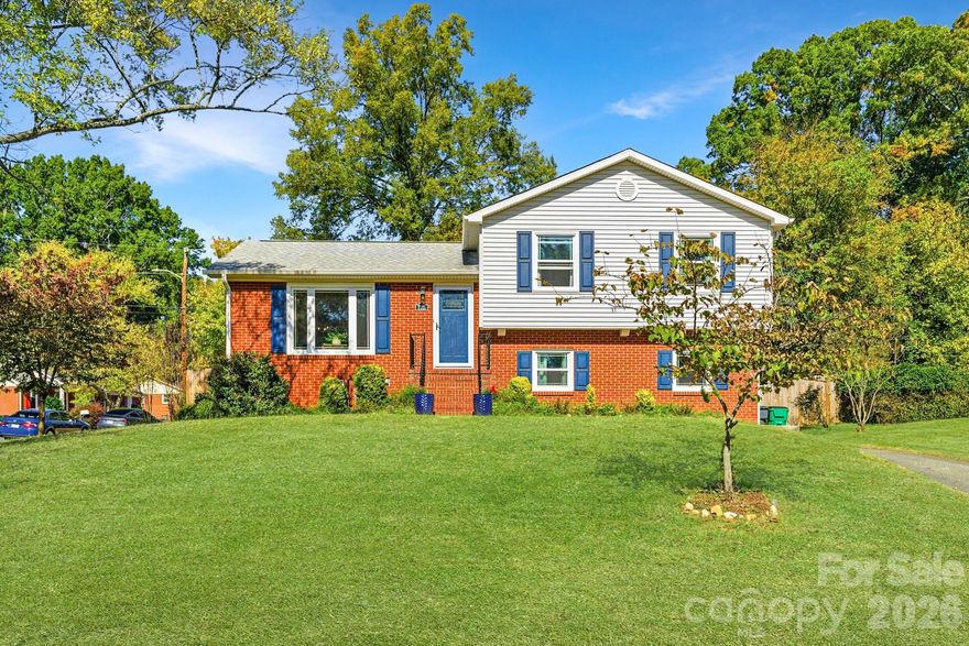 Welcome to this charming and well-maintained split-level home nestled on a large corner lot in one of South Charlotte’s most popular neighborhoods. With 3 bedrooms, 1.5 baths, two comfortable living spaces, and a versatile bonus room, this home offers plenty of room to live, work, and play. Step inside to find a bright and functional layout designed for everyday comfort. The updated kitchen features Cambria quartz countertops, a stylish tile backsplash, painted cabinetry, chic hardware and stainless steel appliances, opening into a cozy dining area—perfect for gathering with family or friends. The upper level includes three spacious bedrooms and an updated full bath, while the lower level offers an additional living area, half bath, and bonus room that can serve as a home office, playroom, or workout space. The laundry room is also on the lower level and includes ample storage space. Thoughtful updates throughout include all new windows and doors, updated bathrooms, newer heat pump with air purifier, new gutters, a privacy fence and more. Outdoors, you’ll love the beautifully landscaped yard that truly shines in the spring, along with a custom hardscaped area ideal for entertaining, grilling, or relaxing after a long day. Located in a quiet section of Starmount, this home offers the perfect balance of tranquility and convenience - move right in with peace of mind knowing so much has already been taken care of! Experience the comfort, charm, and community that make Starmount one of Charlotte’s most beloved neighborhoods. Walk to Sugar Creek Greenway and Starclaire Recreation Club. Peace of mind with a 4 year old RUUD heat pump and transferable warranty. All appliances remain. Welcome home!
