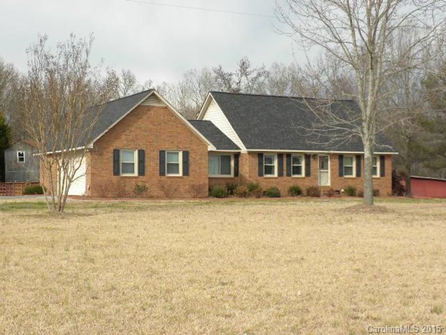 The little farm you've been looking for!  Conveniently located only 5.5 miles out of Monroe! All brick, well loved with fenced pasture and pond ready for your animals.  Large Family Room opens to relaxing screened porch.  Step out of screened porch to a great 16 x 32 in-ground salt water pool! Owners suite on main level, 2 BR's up. Windows replaced @ 5 yrs, dual fuel HP is about 7 years old, Arch shingles @ 4 yrs, new liner, pump and filter in pool.  Peaceable country living at it's best!
