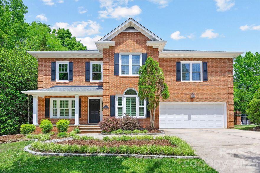 Impeccably maintained traditional brick home tucked on a private cul-de-sac street in an unbeatable SouthPark location! Primary bedroom on the main level and HOA lawn maintenance make for effortless living in this elegant home. Offering 4 bedrooms, 3.5 baths and 3,500+ sq/ft, this residence blends timeless charm with thoughtful updates throughout. This home features new windows (2025), a freshly repainted interior (May 2026), hardwood floors throughout all main living areas and bedrooms, plantation shutters, and new custom carpet on the stairwell. The kitchen has been refreshed with newly painted cabinetry and updated hardware, and includes granite countertops, stainless appliances, breakfast bar seating, walk-in pantry, and a niche ideal for a coffee station/bar. The primary suite boasts a vaulted ceiling, expansive walk-in closet, and spacious en-suite bath with garden tub, walk-in shower, and oversized dual vanity. Upstairs offers 3 secondary bedrooms, each with a walk-in closet and en-suite bath access, plus bonus space/loft. Enjoy outdoor living on the charming covered front porch or rear stone patio overlooking the manicured, private yard with garden-like landscaping. Attached 2-car garage and large walk-in attic offer wonderful storage and convenience. Roof replaced in 2019, most windows replaced 2025. Just minutes from SouthPark shopping, dining, and entertainment and in close proximity to desirable public and private schools this is an unbeatable location!
