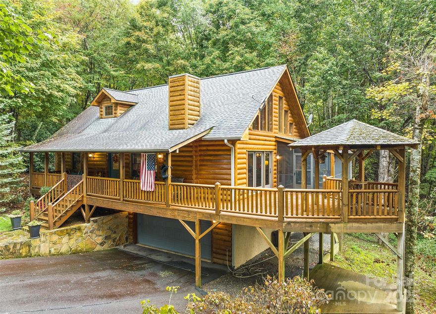Excellent, natural setting at this log home in the Smoky Mountain Retreat at Eagle's Nest. Located above 4,000 feet elevation to enjoy the cool summer weather. It is adjacent to the hiking trail and nature area that leads to a waterfall below. Great floorplan with bamboo wood floors and screened in area on the porch to enjoy outdoor living.