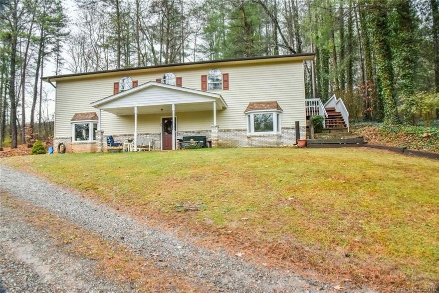 Come check out this special, unrestricted find  close to everything, yet with end-of-the-road privacy! Enjoy feeding the ducks at your very own pond, or play some football on the large, flat grass with bamboo privacy. There's a deck for grilling and a deck off the master. Big, open windows for lots of natural light. And who doesn't love a laundry chute?! Home warranty included.