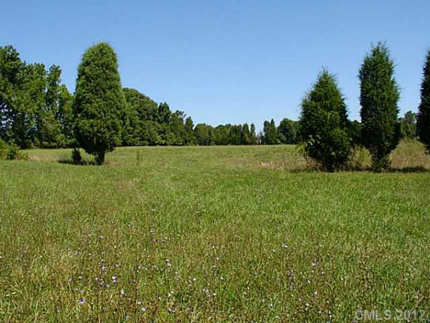 PRICED TO SELL.  DROPPED 100K.  Mini-farm living on this beautiful 20 acre parcel.  Partly wooded, lots of pasture, fencing, map of perc sites available and road maintenance agreement on file.