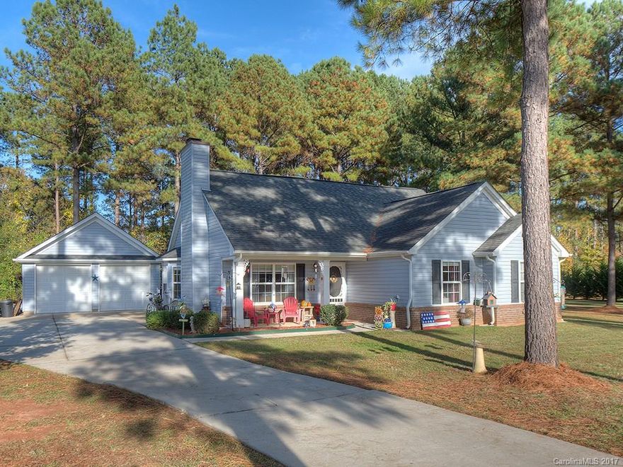 Welcome Home! This house will not last long! Come see this beautiful ranch home in Sherry Acres neighborhood sits on an acre lot. New wood laminate and tile flooring throughout. Family room has vaulted ceilings and cozy wood burning fireplace. Master Suite with walk in closet and sitting/office area. Master bath has walk-in shower. Large screened back porch. Extra deep 2 car garage is perfect for workshop area. Microwave and refrig new this year. W/D, refrigerator convey.