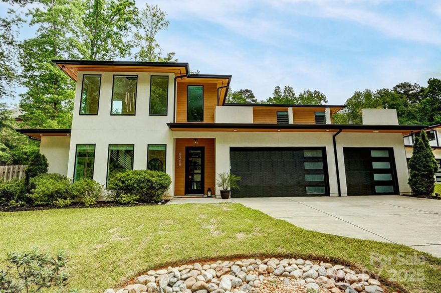 Step into this luxurious modern masterpiece with many high-end features! A floating staircase & oversized picture windows fill the space w/ natural light. The kitchen’s a dream featuring a 6-burner JennAir range & double ovens, waterfall-edge quartz island, & walk-in pantry. A 4-panel sliding door leads to a covered patio, allowing for indoor-outdoor flow. The expansive patio w/ fireplace & private fenced yard create a perfect ambiance for outdoor living. Retreat to your luxurious primary suite with custom closet. Relax in the free-standing tub inside the giant tiled shower, or enjoy the rainhead shower & dual sinks of your spa-like ensuite bath. Upstairs includes more large bedrooms and bathrooms boasting designer finishes like quartz counters & premium tile. An open loft leads to a multi-use rooftop terrace. A 3-car garage offers ample storage. With a drop zone, utility sink, irrigation, & security system this home offers modern amenities. No HOA = less cost and more freedom.