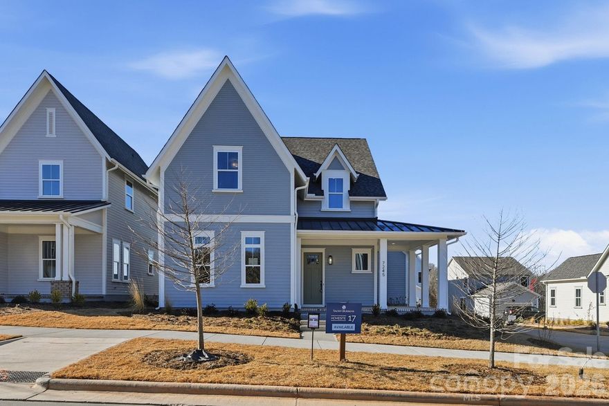 Come fall in love with life at the River District, where the Catawba River and City of Charlotte connect. Surrounded by nature, you'll enjoy hiking, biking and the many planned community amenities the River District has to offer. The Tanner Cottage welcomes you with a charming rocking chair front porch. Inside, the open concept floor plan features an inviting kitchen with a large island, perfect for entertaining. The primary suite is conveniently located  on the main level, with two additional bedrooms and a bonus room upstairs. Come discover your new home in the River District Community!