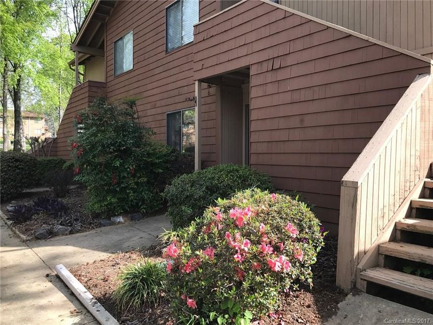 Great location convenient to I-77, shopping and restaurants. Easy living main floor condo with wooded private patio. Updated, wide plank flooring in the bedrooms. All appliances convey with acceptable offer.  You will love living here!