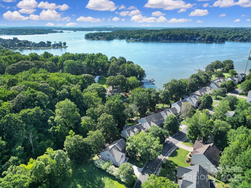 Waterfront home two-story home perfectly positioned on a cove of Lake Wylie, complete with a private kayak launch and deeded boat slip only a few blocks away. House has all new PEX plumbing as of February 2025. The main level spacious primary suite features a walk-in closet and en-suite bathroom, including a garden tub and separate shower. In the updated kitchen, showcasing vibrant blue cabinetry, butcher block and granite countertops, stylish hand scraped clay tile backsplash, battery powered motion activated undermount lighting. The two-story great room is filled with natural light, surround sound, and gas fireplace creating a warm and inviting space with lake views. Upstairs two additional bedrooms plus a generous bonus room that could be a fourth bedroom. Outdoor living is a dream with extended decking, an oversized storage area for garden tools or lake toys, and a backyard that overlooks a tranquil lake cove. Don't miss this rare opportunity to enjoy lake life!