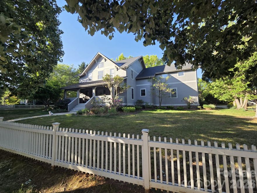 Welcome to 1066 Columbine, a beautifully maintained Craftsman-style home on a prime corner lot in sought-after Biltmore Park. One of the original show homes in this section and one of only six white picket fenced homes on the show home street, this property offers standout curb appeal with exquisite landscaping, mature Japanese maples, birch tree, raised garden beds, automatic irrigation, and a charming front yard complete with swing and sandbox.
The inviting covered front porch features two seating areas, while the backyard is designed for relaxing and entertaining with a teak-style wood deck, wisteria-covered trellis, and a large stone fire pit with seating for 10+ Adirondack chairs. A rear-entry driveway leads to the two-car garage with abundant shelving.
Inside, this two-story home offers 4 bedrooms, 3.5 baths, and a spacious upstairs entertainment room. Rich hardwood floors and crown molding run throughout, complemented by a gas fireplace and thoughtful upgrades including gas heat, a full-house circulation pump for instant hot water, two-zone HVAC, and a newer 2023 HVAC system. The home also features a four-stage whole-house Rhino water filtration system and a smart flow water system with leak detection, automatic shut-off, and app connectivity.
The fully modernized kitchen is a standout, anchored by an oversized 35+ square foot chef’s island and premium Bosch appliances, including a refrigerator with ice maker and cold water filter, microwave, and dual stack gas/electric ovens. A five-burner gas cooktop and professional exterior-vented range hood complete the space, while the dining area is enhanced by custom paneling for added warmth and character.
Located just a short distance to Biltmore Park and near the community pool, this exceptional home blends timeless style, modern comfort, and an unbeatable location.