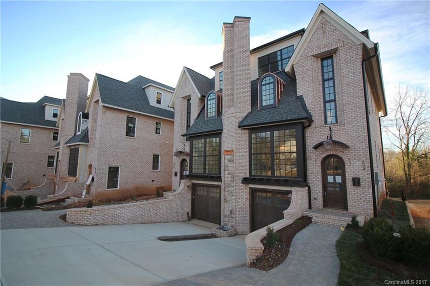 Incredible Dilworth location - walking distance to shopping, dining, and more! Exclusive luxury English farmhouse inspired duets feature brick veneer, tons of natural light, 2 fireplaces, Thermador professional appliances, site finished oak hardwoods, media & recreation areas, & master suite with vaulted ceiling & exposed beams. Incredible outdoor living upgrade packages for seamless indoor/outdoor entertaining. Similar community coming soon to Elizabeth - The Towers