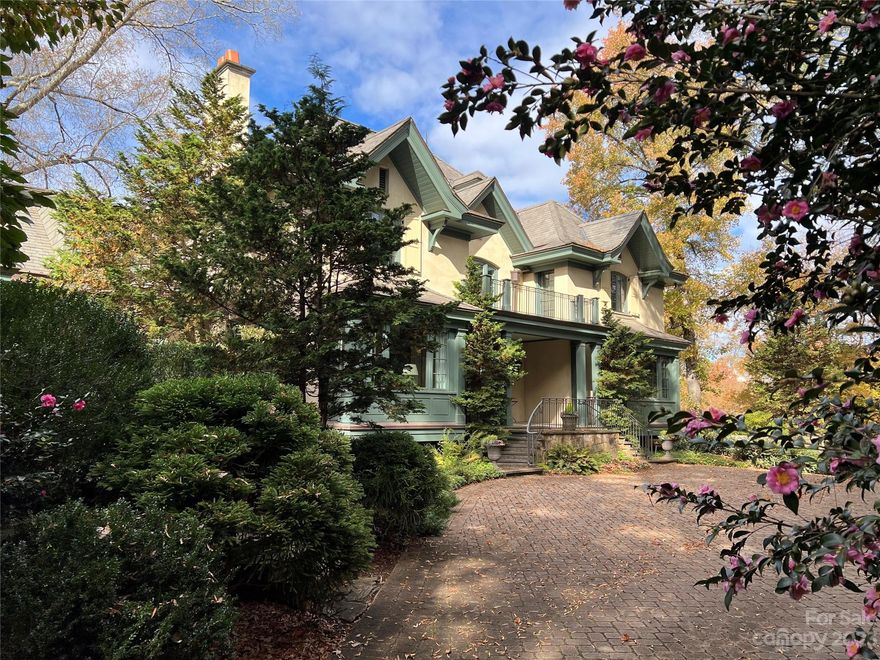 Rare opportunity in Eastover! Magnificent home built by Whitlock & designed by renowned architect, Jay Dalgliesh, featuring 6 BR, 7 full BA & 2 half BA.  Attention to detail includes reclaimed Antique Heart Pine flooring, high ceilings w/custom millwork & cabinetry. Ideal for entertaining w/spacious formal areas, large kitchen w/butlery for catering prep. The screened porch offers outdoor living space overlooking a beautifully landscaped yard w/extensive lighting. An elevator accesses 3 floors of living space as well as an oversized attic which provides easy access to abundant storage. A private staircase off the back hall leads to a bonus room situated above the heated garage. The stucco & stone exterior has 10" copper gutter system, Vermont Slate roof & Tennessee Fieldstone/Pennsylvania Bluestone stonework accents & porches.  A sweeping front lawn offers an impressive entry to this spacious residence. .91 acres located on Eastover Rd--one of the most desirable streets in Charlotte!