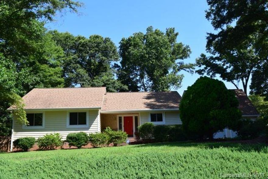 Discover one of Fort Mill's treasures.  This lovely gem is situated on a large half acre lot tucked away in one of Fort Mill's hidden neighborhoods.  Vaulted great room w/ accent beams and woodburning fireplace.  Kitchen fully remodelled with beautiful flooring, glass front cabinets, farmsink, & butcher block counters.  What a gardener's dream! Fully fenced back yard is level & has a large hardscaped patio, fountain, and storage shed.  Extra living space in bonus w/ full bath over garage.