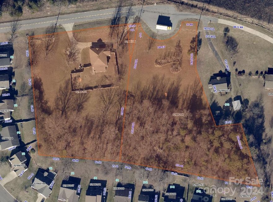 Builders, come take advantage of this prime location area to build multiple homes.  This 3.24 acres is located right by Mallard Creek and 485.  This land is zoned for single family residential but according to Char Meck Zoning, could support up to tri-plexes.  It can not be rezoned multifamily.  There is a home currently located on 1 of the 3 parcels.  It appears to have good bones but needs a lot of rehab.  From my estimation, you maybe able to get up to 8 homes on these lots.  All 3 parcels to be sold together. City water available but not city sewer.  The main for sewer stops at Mallard Woods.  City says builder could connect to main but city will not do it.  House being sold as is