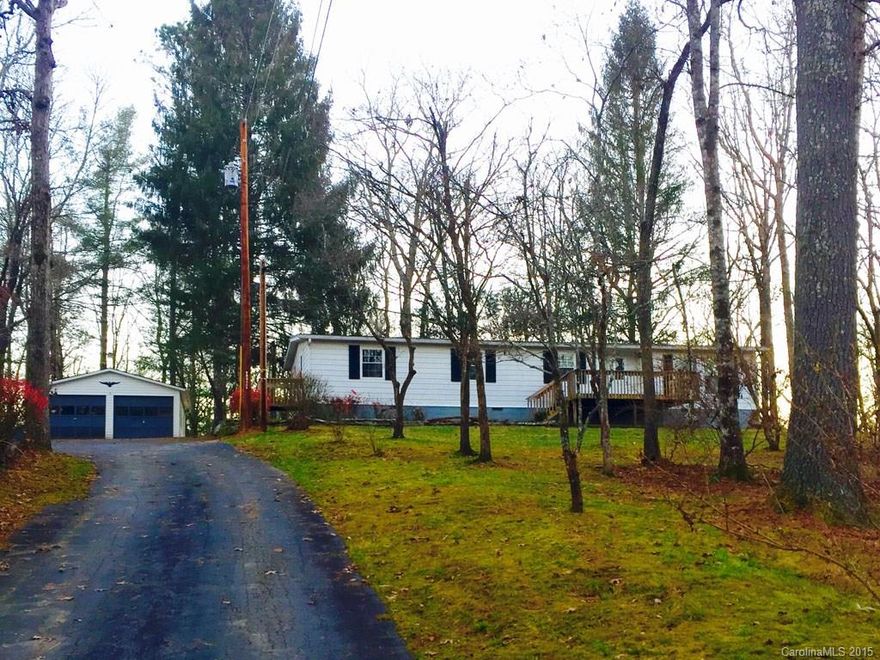 Mountain retreat in lovely private homestead. Plenty of room to roam and enjoy mountain surroundings in this 3 bed/2 bath, one level home. New flooring, master with full bath and cedar walk-in closet. Galley kitchen has eat-in area and dining room. Covered patio and large deck overlooking wooded lot. New HVAC. Detached 2-car garage with workshop inside.