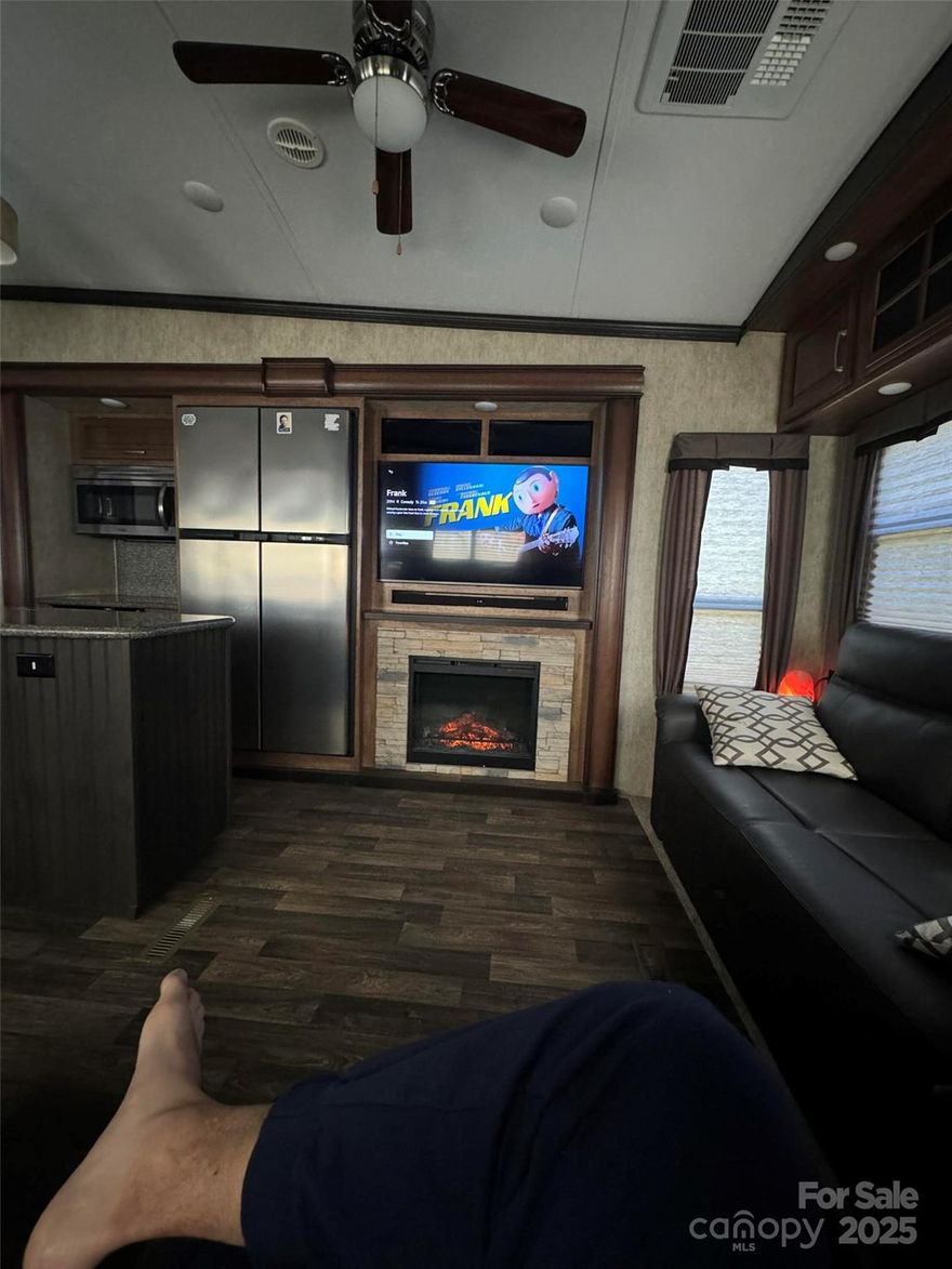 UNRESTRICTED LAND – TINY HOMES WELCOME

0.54 -acre property in the Blue Ridge Mountains with two RV lots, each with power, water, and sewer. One lot has been rented to a long-term tenant , however he understands it’s for sale and can vacate once sold… the other includes a 2017 Montana RV, move-in ready. 8 minutes to town, 20 minutes to Highlands and Lake Glenville. Features a 300-ft well, metal carport, and storage shed. Great income potential or personal retreat.