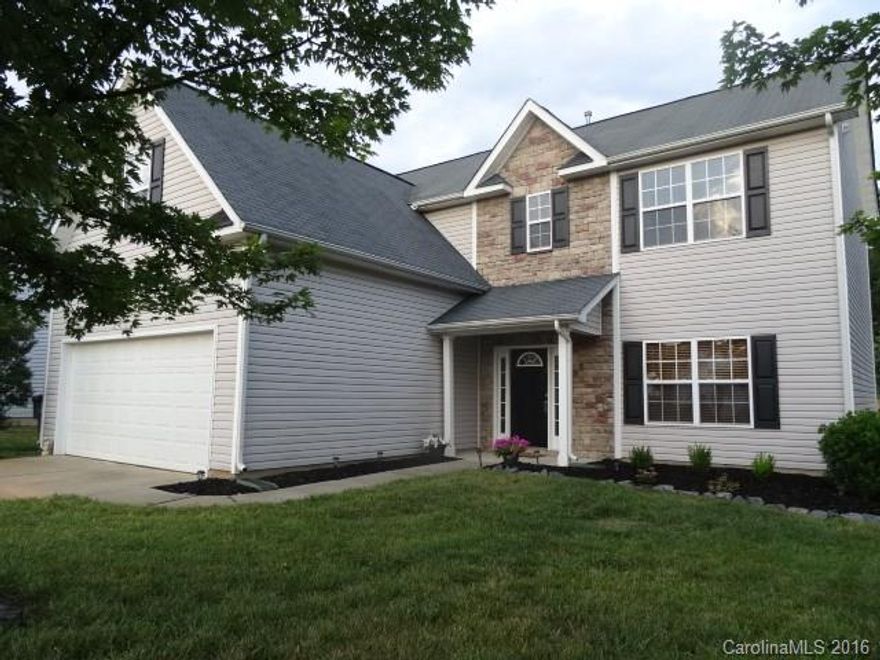 Like new 4 bdr home w/ brand new carpet! This beautifully landscaped & well maintained home is located in Concord just minutes from Concord Mills. Home features wood floors, granite counter tops, ceramic tile back splash in kitchen, ceramic tile, new carpet, beautiful archways, formal dining, huge living room. Master bath features dual sinks, garden tub & stand up shower with ceramic surround. You will love the huge living room, master bdr & good sized secondary bdrs. 4th/Bonus option.