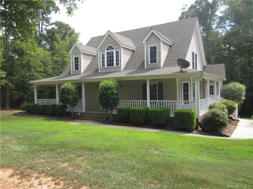 Home w over 2 acres close to everything including interstates, schools, shopping and medical facilities, but feels like it is away from it all. Extremely well appointed, the wooded property has an inground pool, hot tub, screen gazebo and plenty of privacy. The house has a wrap around porch, perfect for enjoying a drink in the evening or morning coffee. Hardwood floors throughout the main level including the master suite complete w whirlpool tub and separate glass shower, dbl vanities and WIC.