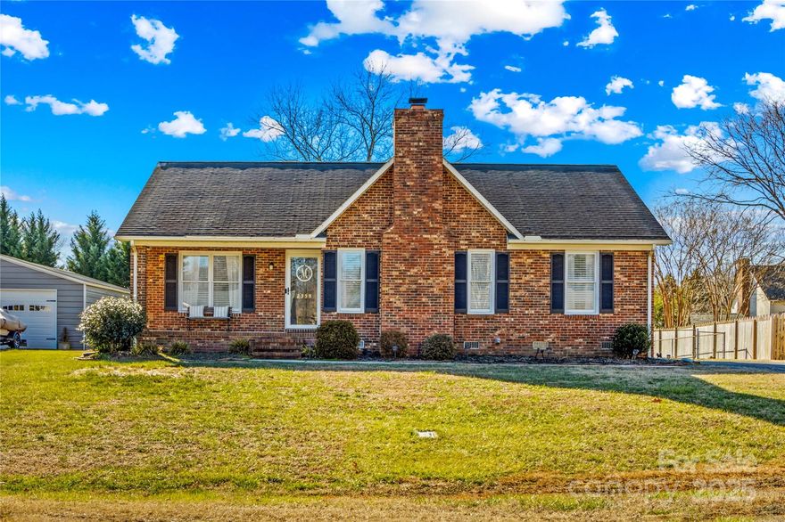 This beautifully updated full-brick home offers 3 bedrooms and 2 baths with a fully fenced back yard. You will love the spacious kitchen that is complete with updated stainless appliances, lots of cabinet space, and beautiful lighting. Off the kitchen is a formal dining room that is perfect for entertaining guests. The cozy brick fireplace in the living room has gas logs and is wonderful for the chilly winter evenings. Huge primary suite opens to back deck and includes a walk-in closet. Outbuilding in back yard conveys and provides extra storage space. Sellers replaced HVAC and water heater in 2023. Amazing location that is convenient to shopping, dining, and major interstates. Kannapolis Eastside Park is coming soon. Expected completion date is September 2025 - May 2026.