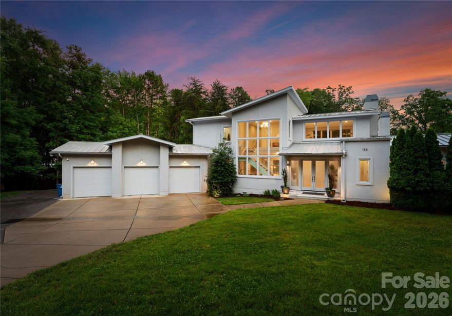 Rare Simonini-built contemporary waterfront home offering privacy, style, and flexibility with no HOA , CC&Rs, or rental restrictions. Situated on a sprawling 1.4-acre lot, this architectural gem is designed for effortless indoor-outdoor living. Soaring floor-to-ceiling windows flood the space with natural light while expandable sliding glass doors open to a covered lanai complete with ceiling heaters and an automated screen system, perfect for year-round entertaining. Inside, the chef’s kitchen is outfitted with top-of-the-line Thermador appliances and custom backlit cabinetry. Additional features include Sonos whole-house audio and Honeywell smart home automation managing HVAC, humidifier, lighting, security, and more! The luxurious Master bath features heated floors, digital showers, EAGO jetted soaking tub. Additional highlights include: custom wood stairs with cable railing, auto shades, high-end lighting by Visual Comfort, and a beautifully crafted home office with built-ins.