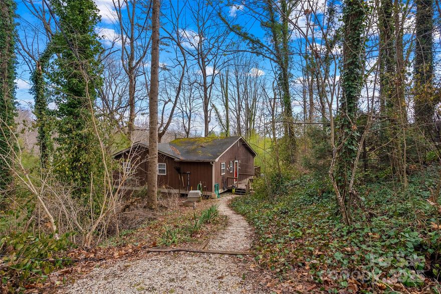 Discover a fantastic opportunity in the heart of South Asheville's Royal Pines neighborhood. This charming home offers an ideal location just 5-10 minutes from local restaurants, grocery stores, parks, and schools, and only 25 minutes from downtown Asheville's vibrant scene. Featuring a cozy layout with plenty of natural light and a spacious yard with the possibility of gardening, pets, or outdoor gatherings, this property is full of potential.

While the home does require some repairs due to downed trees from Hurricane Helene, it's the perfect canvas for a renovation project to unlock incredible equity. This is an "as is" sale. Whether you're an investor looking for your next project or a first-time homebuyer eager to create your dream space, this property is a rare find in a sought-after neighborhood.

This home is bursting with possibilities as well as a motivated seller. Schedule your showing today!