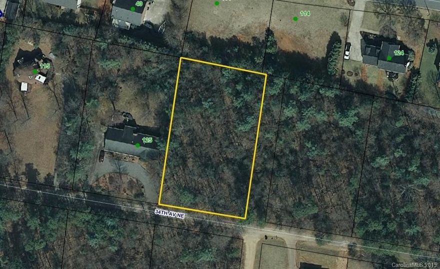 Wooded lot in NE Hickory. Located off Hwy 127 between Belle Hollow Shopping Center and Jenkins Elementary. Convenient location to shopping, dining, schools & Lake Hickory.