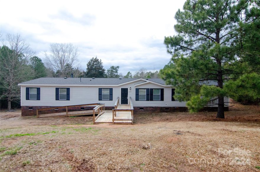 Seller offering $5000 toward closing costs!!!Schedule today! Spacious and Move in Ready!!!! 4 bedroom/3.5 bath home located in the Van Wyck area. Home features a large living room, dining area, stainless steel appliances, Split bedroom floor plan, Primary Bedroom with 2 full bathrooms and walk in closet. Updates include: New Windows, All Bathrooms have been completely remodeled, Vinyl Luxury Plank floors, new fixtures throughout & fresh paint. New roof in 2022 and HVAC is newer as well.