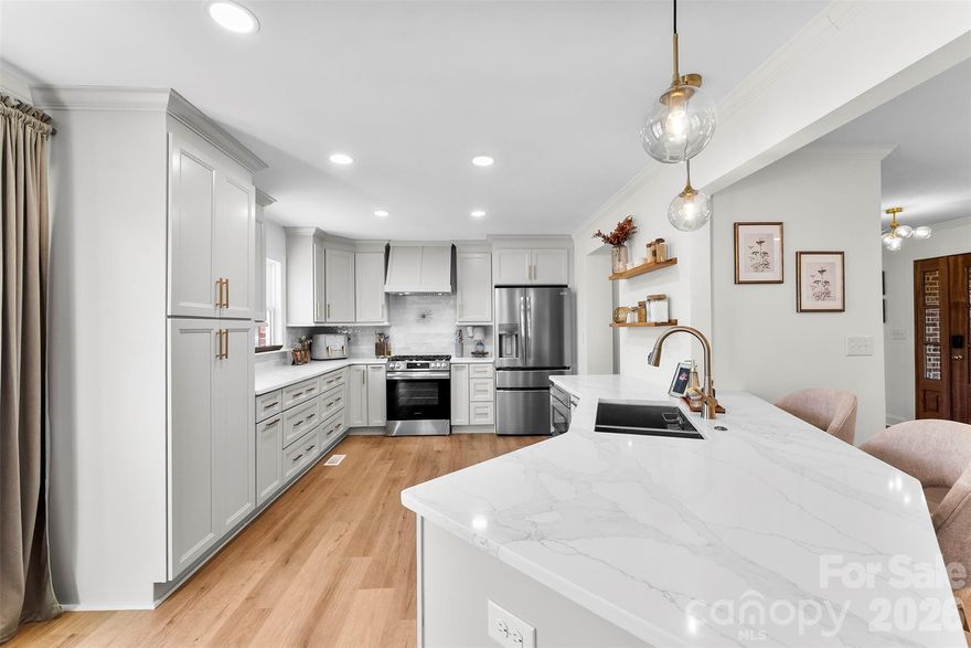 This beautifully remodeled home offers a blend of modern upgrades and peaceful living. Completed in 2025, every update has been thoughtfully executed to showcase the home’s beauty and functionality while giving you the peace of mind that big ticket items have been taken care of. Appraised July 2025- List price is well UNDER appraised value. 

The bright, spacious kitchen features quartz countertops, brand-new appliances including a built-in cabinetry microwave, and ample workspace—ideal for both everyday living and entertaining. With 4 bedrooms and 2.5 baths, the layout is both versatile and inviting. The primary suite offers a large closet and a private ensuite bathroom. Downstairs you will find a flex room with a wood burning fireplace waiting for you to turn it into your dream space. Outside you can enjoy the large two-acre lot and brand-new in-ground saltwater pool, perfect for summer gatherings or quiet evenings at home. This move-in-ready property combines modern finishes and a prime Clover location. 

Some of the 2025 updates include: Heating and cooling systems, tankless hot water heater, windows, a saltwater fiberglass pool, the entire kitchen- including cabinetry, LVP flooring in common spaces, carpet bedrooms and carpet flex space.