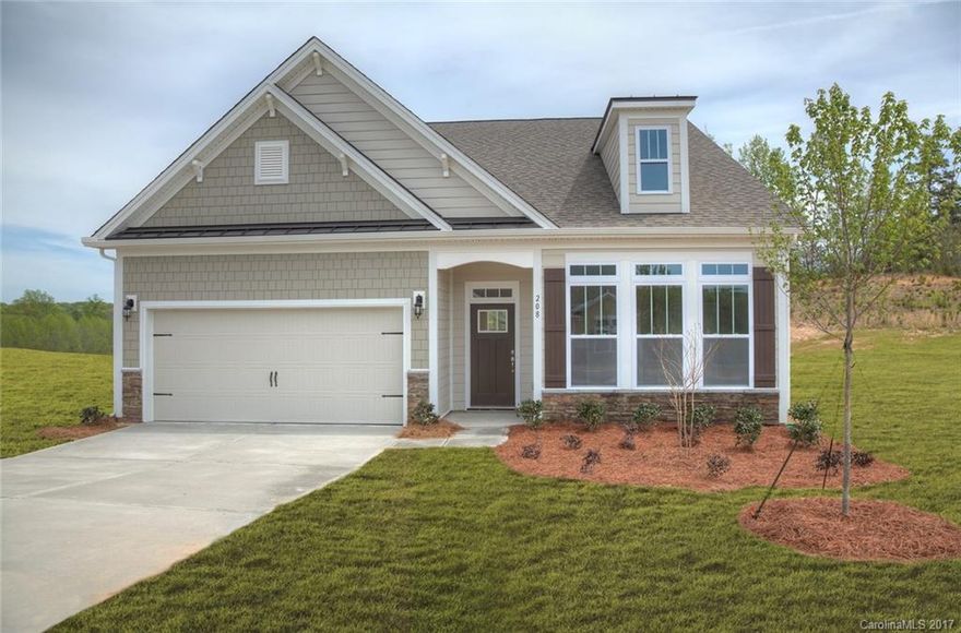 REDUCED AND PRICED TO SELL!!!Forest Grove is finally open and selling this popular RANCH floor plan! This 3 bed/2bath beauty has it all. Gourmet kitchen with double ovens and a gas cooktop, granite in the kitchen and all baths. Hardwoods on the main level and carpet in all bedrooms. Tile in all baths and even in the laundry room! So many upgraded options to see. WOODED BACKYARD!!!