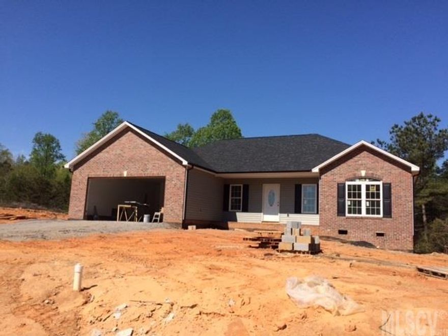 NEW HOME SURE TO IMPRESS!!! Home built with character including many upscale features. Drive up to the home and see the quality workmanship and custom features. Step inside the home take a look down at the beautiful true hardwoods, tile and premium carpets. Take a look up and see the roomy cathedral ceilings. A home like this will not last. 3 Bedroom, 2 bath,Call quickly!!!