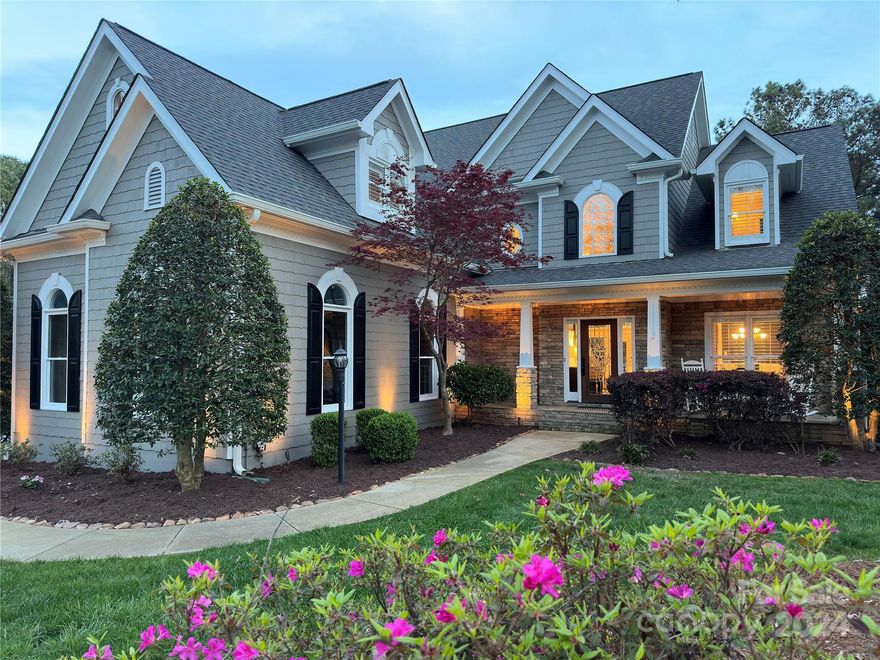 Nestled in The Point and just a 5-minute walk from Trump National Golf Club, 182 Old Post Road boasts a stunning Nantucket-style design. This exquisite home features 4 bedrooms, cedar shake siding, and an incredible swimming pool and spa, perfect for relaxation or entertaining. Additionally, a deeded boat slip right across the street offers easy lake access and the Point’s walking trail is located just outside the rear gate. Enjoy luxurious amenities including golf, tennis, spa, dining and more at the club as well as the newly installed Fazio Five short game complex and pickleball facility.  A true haven for those seeking elegance, convenience and entertainment in Mooresville. Hardwood floors refinished in 2022, interior paint in 2022. New roof installed in 2022 with a 20-year warranty and the exterior painted in 2024. Deeded slip is Pier 1- Slip 2 which is the left dock, 2nd space on the left.