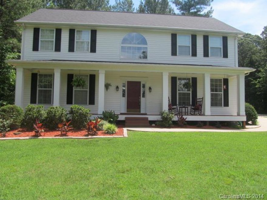 Immaculate 5 bedroom . Homeowner has taken pride in home ownership and it shows. Within walking distance to lake access and boat slips. Gourmet kitchen with stainless steel appliances. Home shows like a model with very lovely décor and plenty of natural light. The front porch features seasonal water view.  Level lot includes hardwoods for added privacy. Large 12 x 24   workshop with electric and above storage area. Patio is lovely with pavers to enjoy those summer evenings. Seller is conveying washer and dryer , TV in great room and TV in upstairs bedroom, generator to help power home in an outage. HOA has an annual lottery for boat slip. Seller says has always been able to get slip. Additional $257 per year for boat slip. Lake access ramp as well