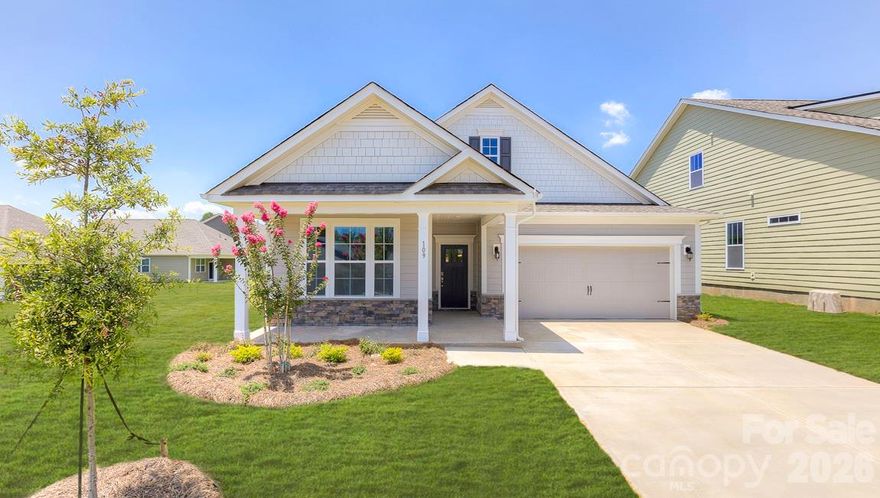 Tap Root Farms is a master planned community in Fletcher, NC. Community features include a 5,000 square foot resort style clubhouse with gym, extra-large swimming pool, playground, 6 pickle ball courts and dog park. Minutes to Downtown Fletcher and easy access to I-26 for commuting. Enter the home from the front porch and into the foyer. You will find two bedrooms with a full bathroom at the front of the home. The living area, and kitchen are open to create a seamless transition and offer entry to the back porch. The kitchen includes breakfast bar, ss appliances, and large walk-in pantry. Towards the back of the home, you’ll find the primary suite with attached bathroom and two generous walk-in closets. *Home features are subject to change without notice. Internet service not included. Sq footages are approximate*