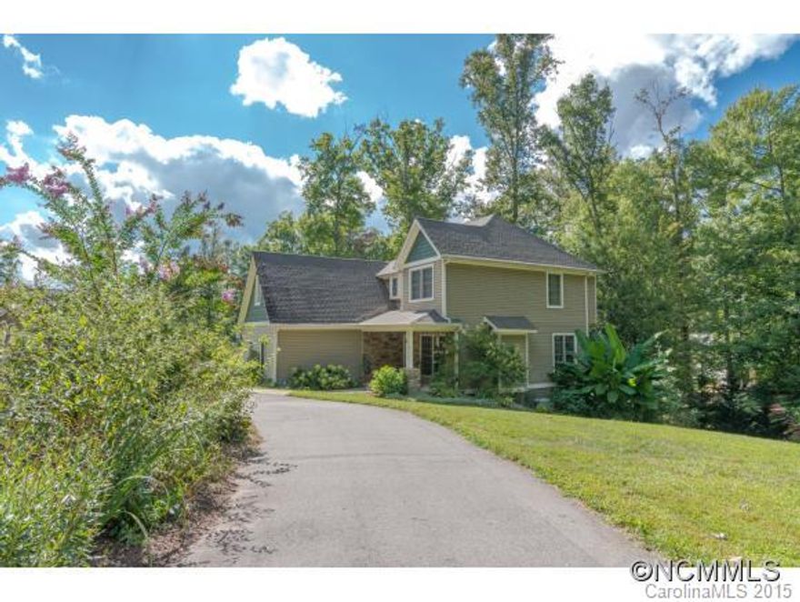 This home has the space, location & styling! Hardwood floors on main level; wood floors 2nd floor, with Arts & Crafts detailing. Built-ins & surround sound in media room for home theater & office & walk-out basement. Dining room is great for entertaining. Deck, covered rocking chair front porch-all on a wooded private lot near all the happenings of sport park, schools, shopping, parkway, Arboretum. County taxes!