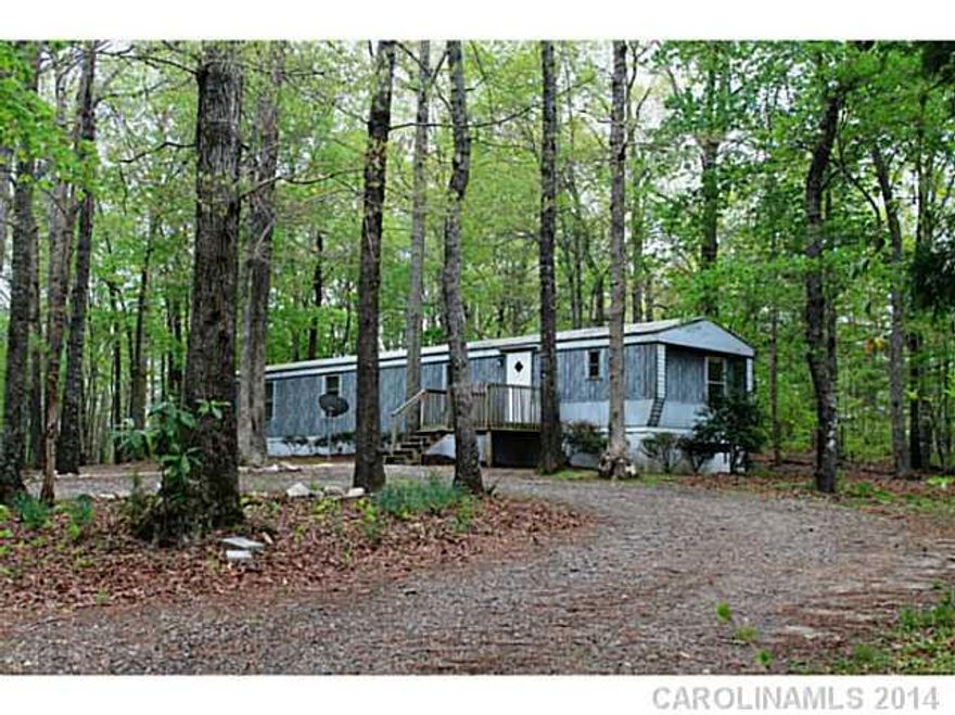 SELLER FINANCING AVAILABLE!! A home with Indian Land schools and low taxes at this price is UNBELIVABLE!! This 2 bedroom, 2 bath mobile home sits on .68 acres of mature hardwoods with a view of a large pond. A great location that's an easy drive to Charlotte, shopping, and medical facilities. A quiet, peaceful place to call home. Call today for a private showing of this home.