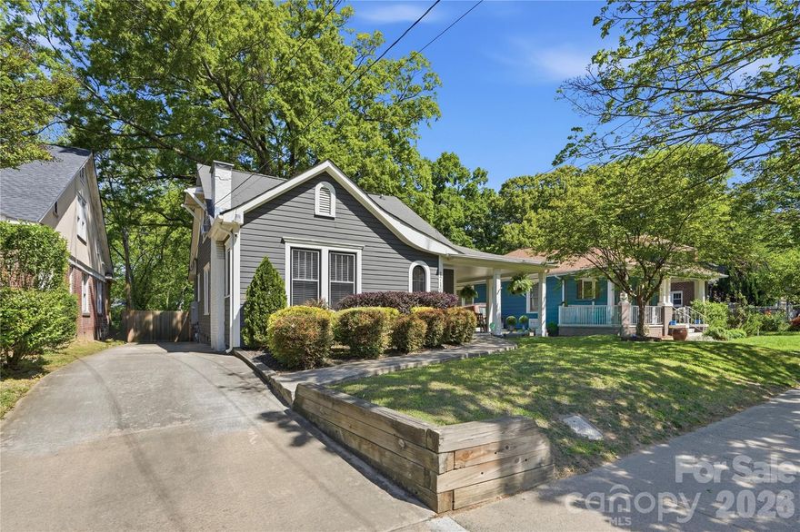 Charming bungalow on one of Wilmore’s most coveted streets with rare Uptown skyline views! Incredible location with easy access to South End, Uptown, Bank of America Stadium, shopping, dining & everything that makes this area so special Classic covered front porch welcomes you inside to a light-filled floorplan with hardwoods, updated baths, modern lighting & beautifully renovated kitchen featuring quartz counters, white Shaker style cabinets, open shelving, bar seating, farm sink & S/S appliances. Upstairs primary suite offers a private retreat with 2 closets & updated bath! Step outside to a fenced in backyard complete with refinished deck, patio, hot tub & spacious storage shed! Meaningful recent upgrades include substantial 2025 plumbing improvements with new high-pressure PEX water lines, sump pump, water filtration/anti-scale system & partial encapsulation, plus exterior paint in 2022. Prime location near the future Iron District redevelopment adds even more long-term appeal! Home is part of Charlotte Historic District Commission - Wilmore Neighborhood Association