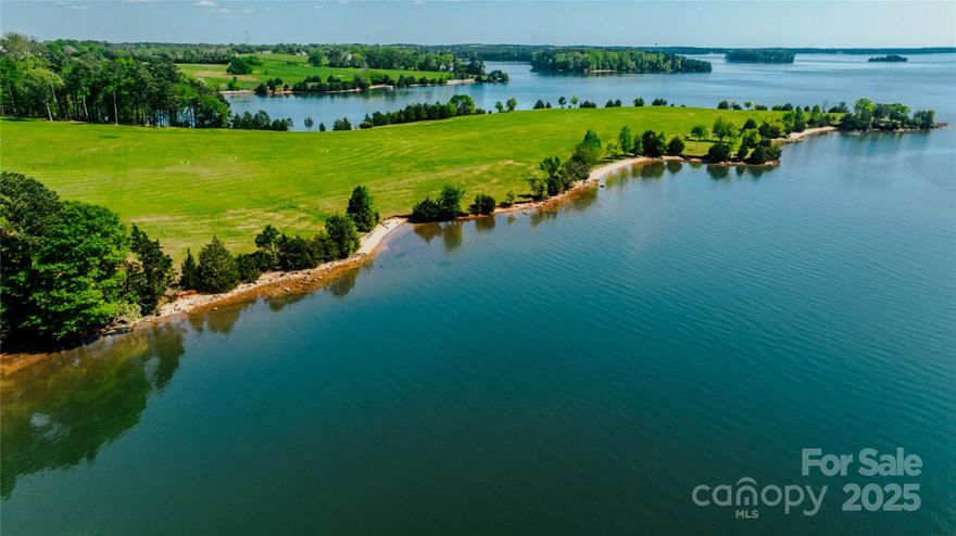 Here is a once in a lifetime opportunity to own one of the most incredible lakefront properties you will ever see! The grand stone entrance to a gradual winding drive will lead you to 32+\- acres of beautiful pastures surrounded by 5,000+\-ft. of water frontage and many white sandy beaches along the peninsula. There are multiple home sites to choose from, all of which provide views up to 3 miles across the lake. All nice usable pastures with some mature hardwoods allowing for a complete view of the lake. Approximately 20 min from downtown Chapin, & Winnsboro & only approximately 30 min from Irmo, Lake Murray & Columbia. Only 30 min from the new Scout Motor Plant.

MASSIVE INVESTMENT OPPORTUNITY! With R-1 zoning & city water available, this property holds an opportunity for high density waterfront development (Approximately 15,000 sq ft lots). With the explosion of growth in Fairfield County, Blythewood and Lake Murray area, this property is positioned for future economic growth.