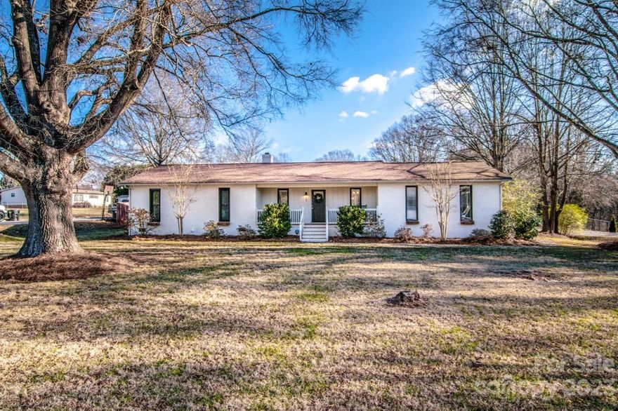 Beautiful Brick Ranch! Just Outside of Downtown Mooresville! Curb Appeal at it's Best! NO HOA! Fresh Paint! New Windows! This 4 Bed 2 Bath Home boasts an open floor plan, 2 Spacious Living Rooms!  Granite Countertops!  Stainless Steel Appliances,  Master Suite w/ Walk in Shower! Large Flat Lot Fully Fenced in!  Relax or Entertain around a spacious IN GROUND POOL!  Private Drive wraps around to ample parking!  Convenient to Downtown Mooresville, Restaurants, Shopping, Parks, Schools and I-77!  Award Winning Mooresville School District! Back on Market at No Fault to Seller!