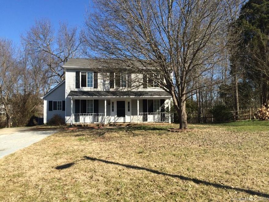 Home in desirable Steele Creek.  Large lot and covered front porch.  New tile in bathrooms.  Large deck.  Vinyl floors in bedrooms.  Dining room is currently being used as a downstairs bedroom but can easily be converted back.  Home being sold as is.  Seller to make no repairs.