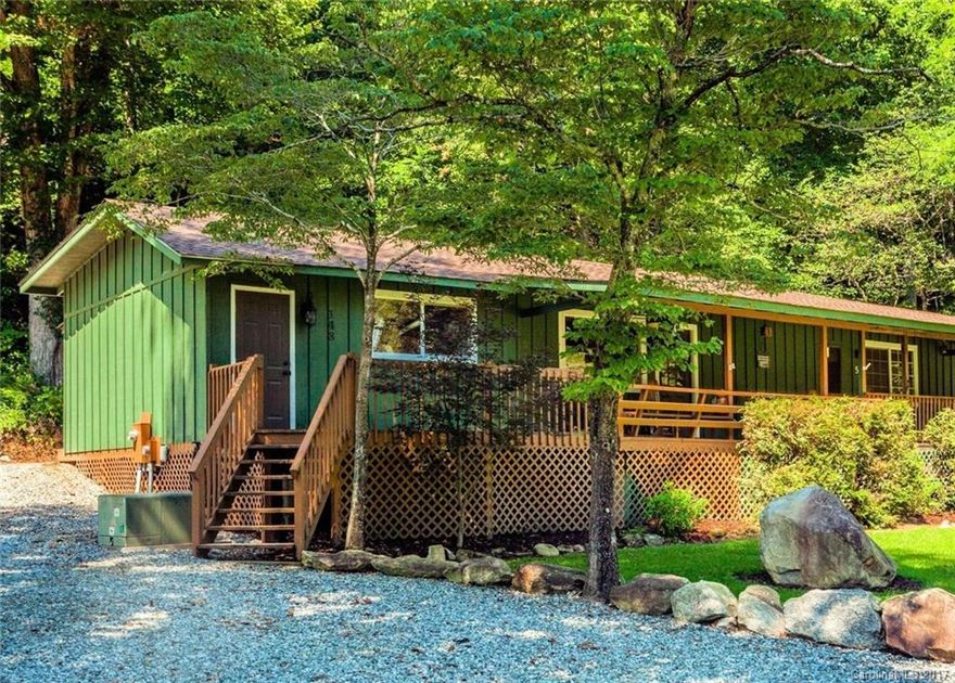 Lake Lure Village Resort with its beautiful community shared lakefront on Lake Lure....  BOAT SLIP IS AVAILABLE WITHOUT A WAIT. Two marinas and a beach on the lake are shared by the owners. 148 Winding Creek is 1/2 Duplex and has been recently refurbished: new kitchen cabinets, granite countertops, SS appliances, updated bathrooms, new roof, replacement windows.  Wood and ceramic floors. HOA includes water and community sewer.  Adjacent unit also available.