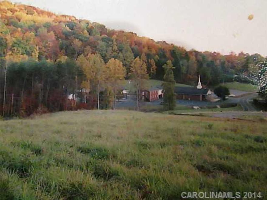 Great Views with 7 acres in the Ellendale Community. The property has over 1,300 feet of road footage. No restrictions.