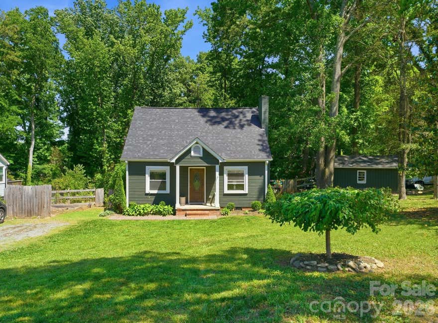 Charming bungalow on nearly half an acre just 15 minutes from Uptown Charlotte. Tucked on a quiet street, this 3 bed, 2 bath home offers a functional layout with a main-level primary, living room, dining area, and dedicated office/flex space.

Major updates include roof (2021) and HVAC (2023). Enjoy outdoor living on the large deck (2023), overlooking a spacious, private yard with room to expand, garden, or play.

Detached garage and additional shed are fully wired—ideal for a workshop, hobbies, or extra storage. No HOA.

Extremely well maintained with space, privacy, and flexibility that’s hard to find this close to the city.