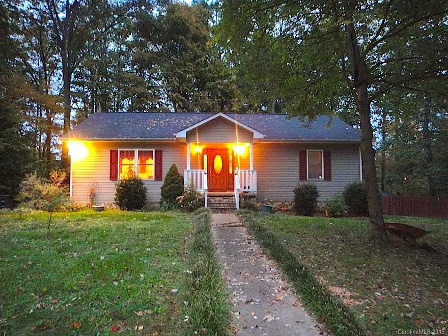 PRICE BELOW TAX VALUE!  SELLER IS MOTIVATED!! No where else can you find such a convenient location, nearly 1 acre private lot, and this much square footage at this price! What more could you want? This home boasts an open floor plan, vaulted ceilings, beautiful hardwoods, an oversized deck, fenced back yard, walk-in closets, additional living space in basement, wooded lot.  This home does need a little TLC so it's priced to sell!