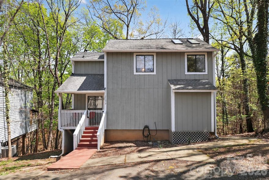 Beautifully updated bungalow-style home in the heart of Tega Cay, just moments from Lake Wylie. This move-in ready home offers an open floor plan filled with natural light, highlighted by skylights and a walkout balcony overlooking a private, wooded backdrop where wildlife is often seen. The thoughtfully designed living spaces blend comfort and functionality, while the upstairs bedroom features solar blackout skylights for both natural light and complete privacy. Enjoy the lifestyle Tega Cay is known for, with access to Lake Wylie, a marina, sandy beach, and a 27-hole golf course set across 200+ acres—all just a short walk or drive away. A rare opportunity to own a turnkey home in one of the area’s most desirable lake communities.