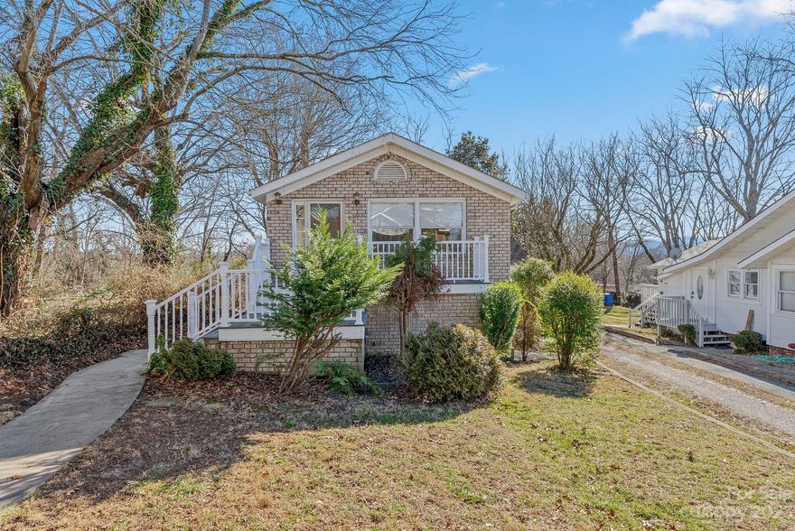 Welcome to this charming 1940's duplex bungalow nestled in the heart of West Asheville. This home offers a unique opportunity to experience the best of Asheville's eclectic lifestyle. With its close proximity to popular restaurants, trendy shops, and vibrant downtown, you'll find yourself immersed in the vibrant energy of this bustling community. As you step into the duplex, you'll be immediately captivated by the warm ambiance that radiates from the original wood floors and vintage details. The main unit features two bedrooms and a bathroom, complete with an enchanting claw foot tub, exuding the timeless charm of the era. The second unit offers a cozy studio space, perfect for those seeking a quiet retreat or a flexible living arrangement. This intimate unit provides a comfortable bedroom area, a well-designed bathroom, and a quaint kitchenette, making it ideal for guests or as an in-law suite. The .22 acre backyard offers ample space for outdoor gatherings or gardening projects.