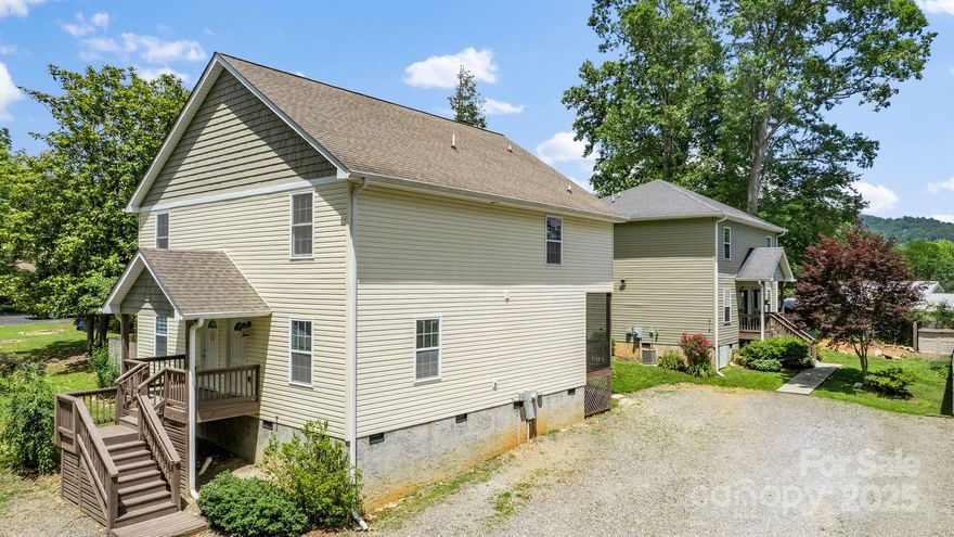 Rare multi-family investment opportunity in popular Black Mountain! Easy access to all the nearby amenities: historic downtown district with local restaurants, shops, and breweries, Lake Tomahawk Park, Black Mountain Golf Club, and ample opportunities for outdoor recreation. Plus, just a short 20-minute drive to neighboring Asheville. This offering consists of four total units in two buildings, each designed as a side-by-side townhouse-style duplex with individual entrances. Units in #214 are 2 bedrooms and 2.5 baths; units in #212 are 2 bedrooms and 1.5 baths; each unit has its own utility meters, laundry, and private outdoor space. Meticulously maintained by the same owners for over a decade, this property is a turnkey investment opportunity in a beautiful area. Consistent rental history with long-term tenants & minimal turnover. Currently, there are 12-month leases in place for three of the units, and a month-to-month lease for the fourth. Additional details available upon request.