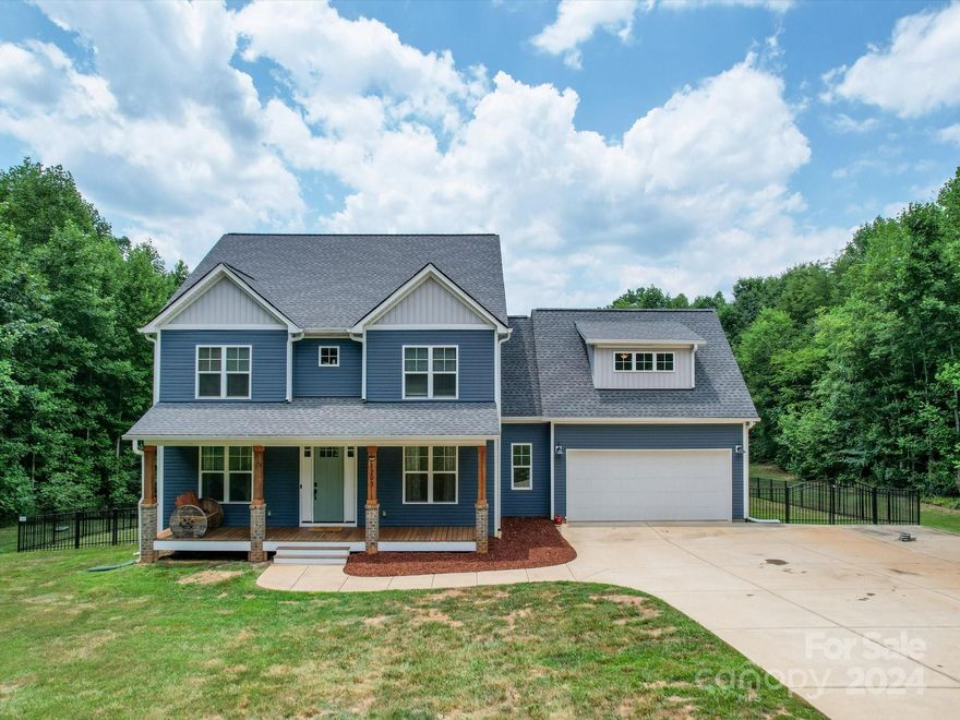 Still looking for your dream home? Here it is! Located in the wonderful town of Clover with a highly sought-after school district, this 4Bd/4ba home that's nestled on a 2.64 acre lot is a dream come true! In this home you will find a beautifully updated kitchen with luxurious quartz countertops and beautiful soft-close cabinetry. You will also find lavish, handscraped European white oak hardwood flooring running throughout the first floor as well as the bonus room, and plush carpeting in the bedrooms. Enjoy a very large primary walk-in closet that has access to the laundry room for convenience. Relax on the screened in back deck that overlooks the peaceful woods that gives ample privacy. Let the kids and pets roam around aimlessly in the beautifully fenced in backyard. This home boasts PLENTY of storage that includes a roll-up door to the fully incapsulated crawlspace. You ABSOLUTELY do not want to miss out on this gem! Book your tour today!!!