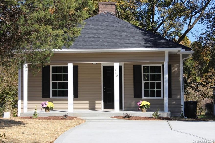 Owner financing! Enjoy the charm of yesteryear with today's modern conveniences. Fully remodeled in 2014, this 1940s bungalow boasts new roof, gutters, siding, energy efficient windows, HVAC, plumbing, electrical, floors, joists, cabinets, appliances, water heater, porch, driveway & stone paver patio. Crown molding highlights arched doorways and endearing beadboard walls. A great home for the price, & all in a convenient location close to schools, shops & restaurants. Owner financing available!