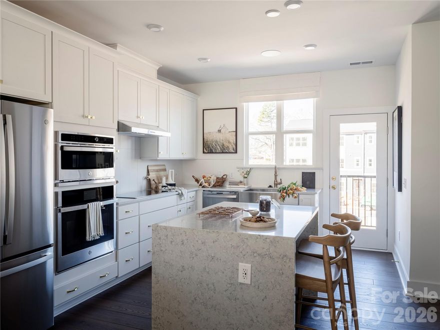 Tucked into a quiet, secluded corner of Context at Oakhurst and surrounded by green space, this Rockwell plan offers a rare blend of privacy and connection. Located at 4019 Cue Ct with an anticipated move-in of September 2026, the home features 3 bedrooms and 3.5 baths, including a private third bedroom with a full bath on the first floor that works beautifully for guests, a home office, or flexible living. The setting feels calm and tucked away, yet remains close to the energy and everyday conveniences that make Oakhurst so desirable. Inside, planned selections elevate the experience, including a gourmet kitchen layout designed for gathering and entertaining, along with oak box stairs that add warmth and architectural character. The primary suite delivers a refined retreat with a dual vanity and a walk-in shower featuring tiled walls and a tiled floor pan for a spa-inspired feel. Designability is central to the journey, giving you the opportunity to personalize key finishes alongside an expert design team. From visiting the award-winning design studio to tracking progress through a one-of-a-kind app, this home offers a building experience that is just as intentional as the finished space.