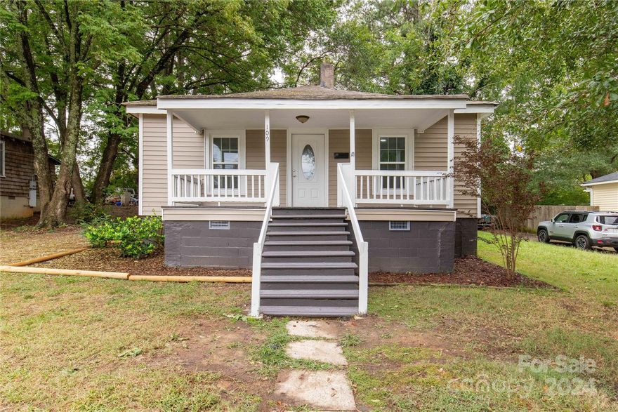 Completely remodeled home on .22 acre lot in Clover. New LVP flooring throughout, new insulated windows, new marble look formica countertops, large sink with new faucet, light fixtures, fans, new bath vanity & faucet, new tub and surround, and new interior paint. Stainless steel and black appliances plu washer & dryer. Covered front porch and fenced level, private backyard. Great first home or investment property. Award winning Clover Schools and walk to downtown, parks, restaurants & shopping.