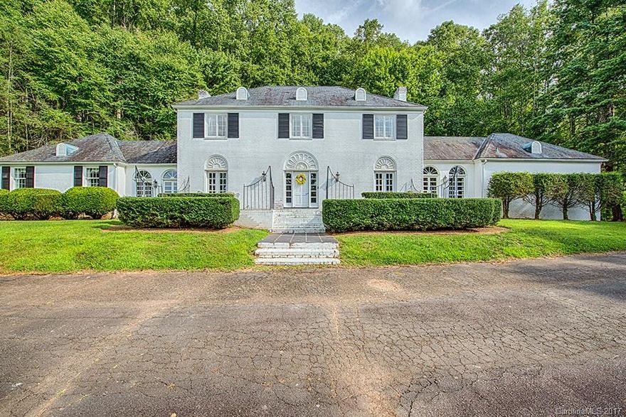 One of a kind estate near the Waynesville Country Club. 5 Bedrooms 3.5 Baths.Soaring foyer with massive staircase. Heart pine floors on main level. Huge Master suite on main level with private study/office. Exquisitely appointed formal living and dining rooms. Large private den with custom built-in cabinetry. Fireplaces in Den,Study,living room and kitchen.  Large kitchen and eat-in area. Large mud room.  2 Car Garage on main level. Bonus room over 2 car garage. 5.26 private acres. Stunning!